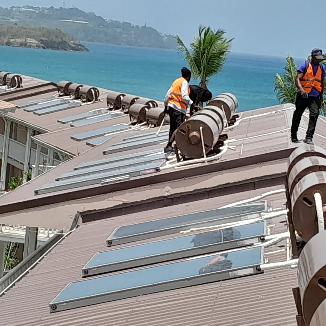 Mega Sun evacuated tube solar water heater installation on Caribbean home roof